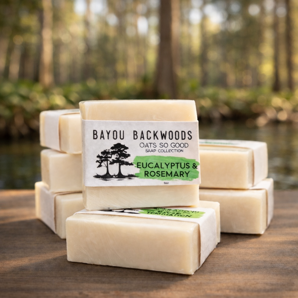 Stack of Bayou Backwoods Eucalyptus and Rosemary Oats So Soft, soap bars with a natural bayou background. Shop small business 