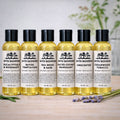 Luxury handcrafted all natural massage body oils by Bayou Backwoods, in 6 scents group product photo.  Shop small business, small batch, Slidell, Pearl River, Mandeville, Covington.