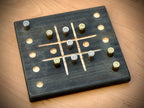 Handmade wooden tic tac toe game with spent bullet casings. Perfect as a gift or home decor. Shop local small business Slidell, Pearl River, Mandeville, Covington
