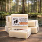 Stack of Bayou Backwoods Salted Coconut Mahogany Oats So Soft, soap bars with a natural bayou background. Shop small business 